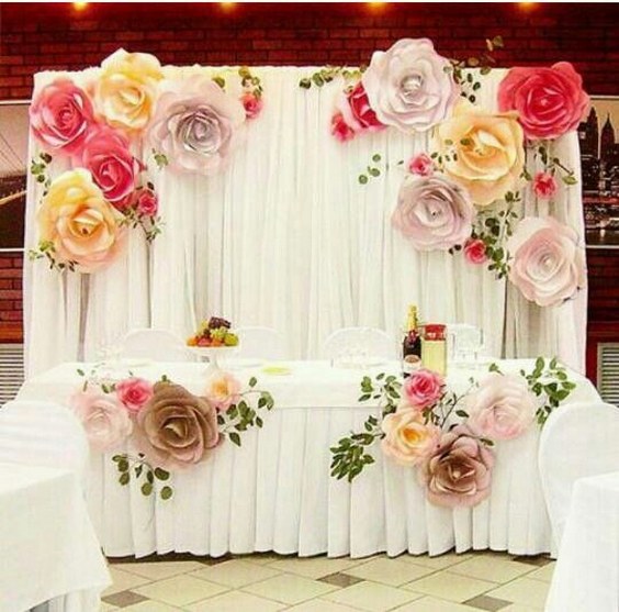 Paper flowers backdrop wedding