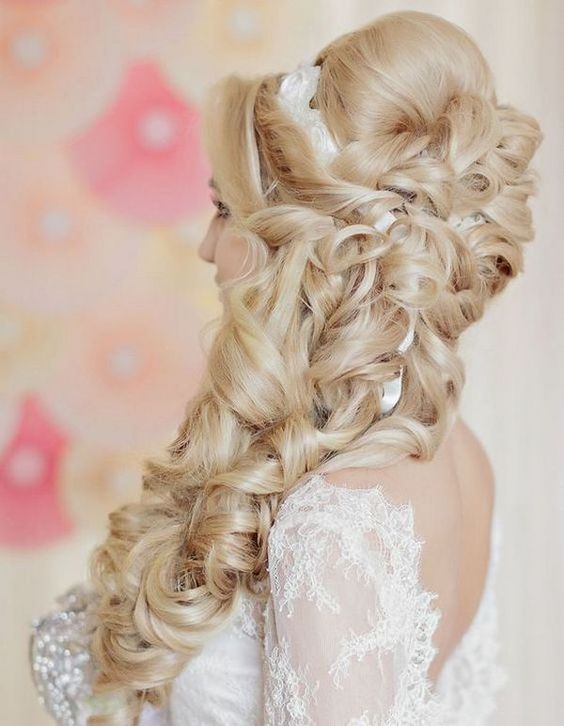 Liliya Fadeeva long curly wedding hairstyle