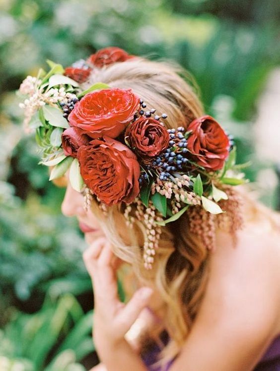 spring wedding hairstyle with red flowers
