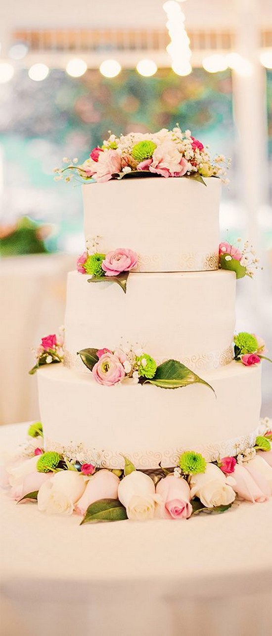 white weding cake with pink flowers