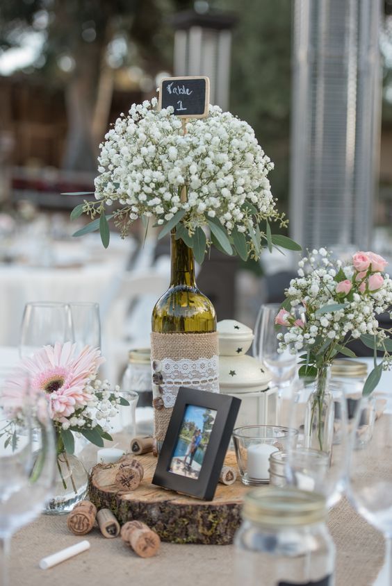 Wine Bottle Centerpieces with Baby’s Breath