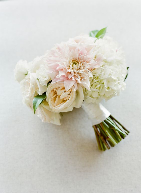 Blush and cream wedding bouquet via Lacie Hansen