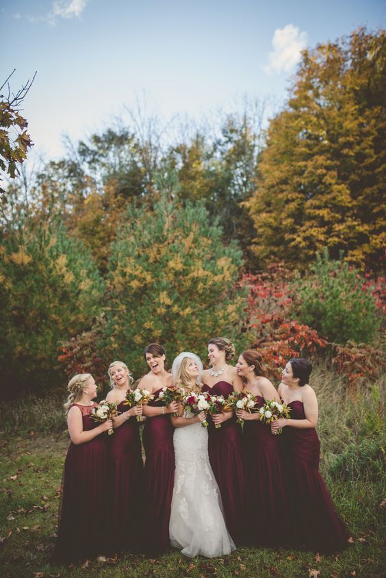 Bridesmaids in crimson dresses