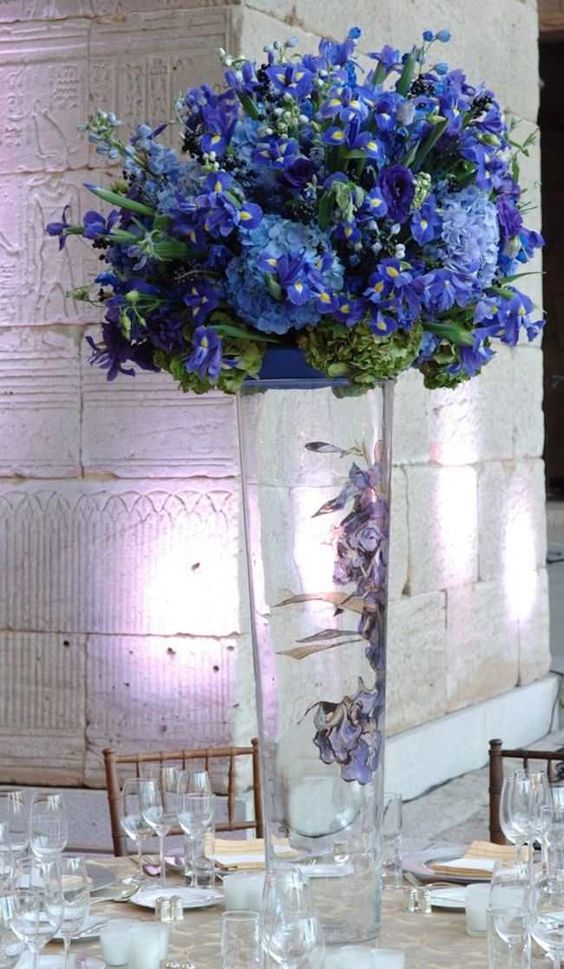 Dark blue florals create a sophisticated vibe! Centerpiece via Preston Bailey