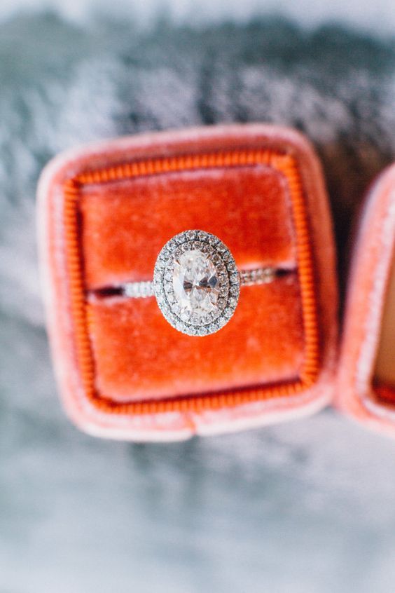 Double halo oval cut engagement ring Photography Melissa Fuller