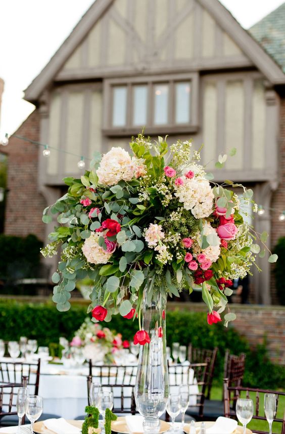 Elegant garden party table decor ideas Cascading centerpieces with roses and greenery
