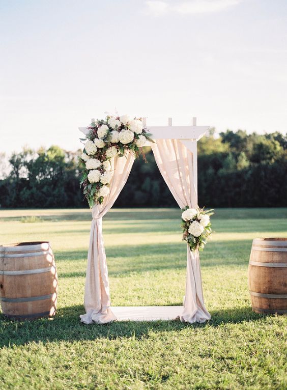Floral Draped Ceremony Arch in Wine Country