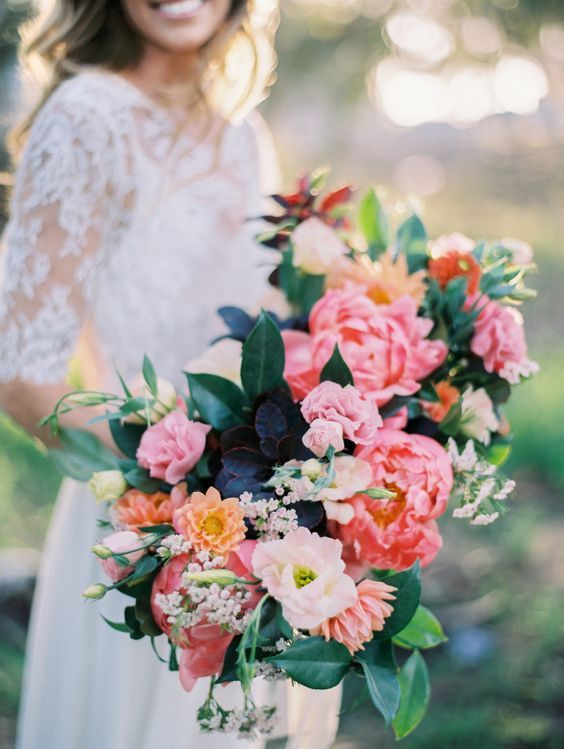 Gorgeous + colorful oval shaped spring bouquet via Natalie Bray