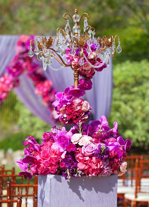 Hot pink purple wedding centerpiece idea via Braja Mandala