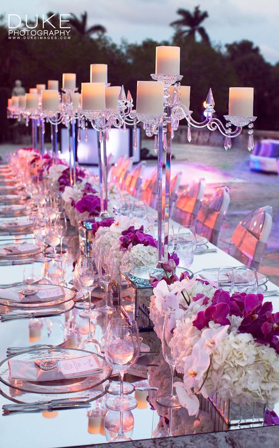 Mirrored décor adds a touch of modern elegance to this outdoor reception