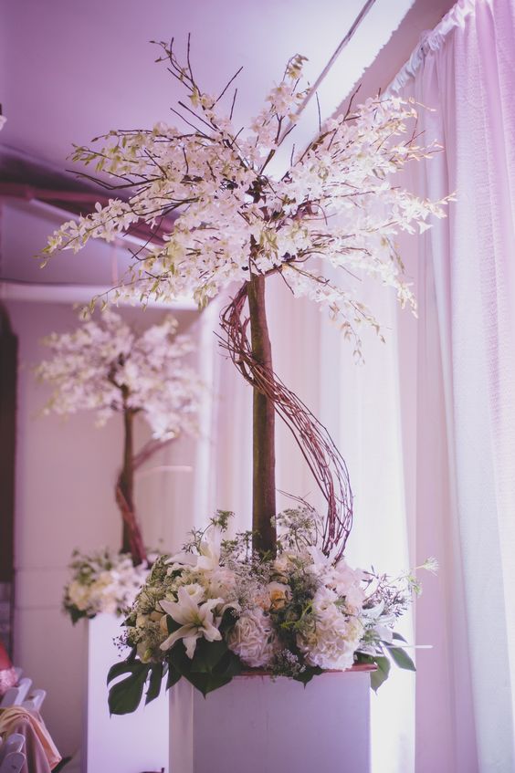 Tall ceremony decor floral idea