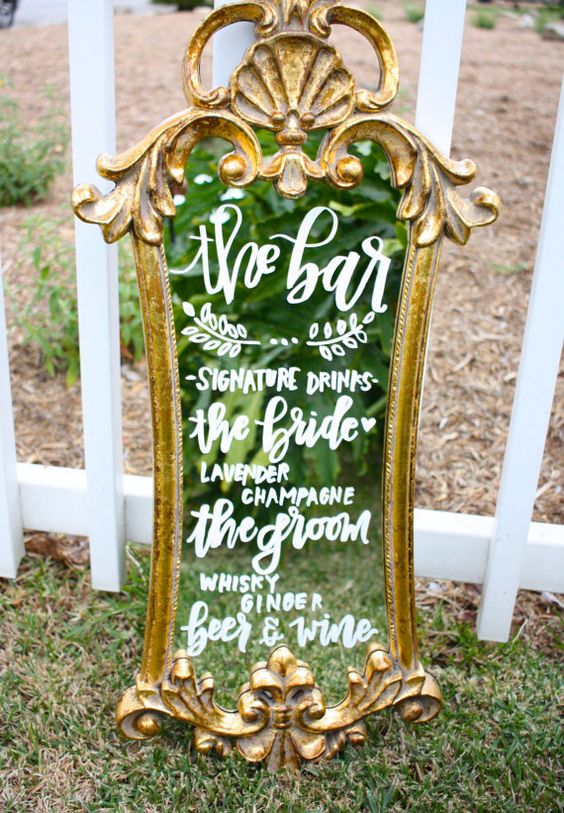 big gold mirrors wedding sign