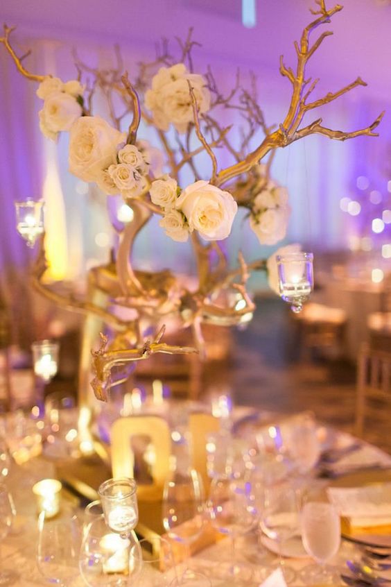 classy white and gold wedding centerpiece via Megan Clouse Photography