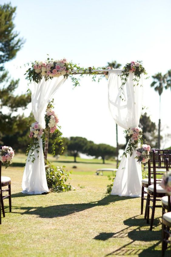floral spring wedding arch via  Chris and Kristen Photography