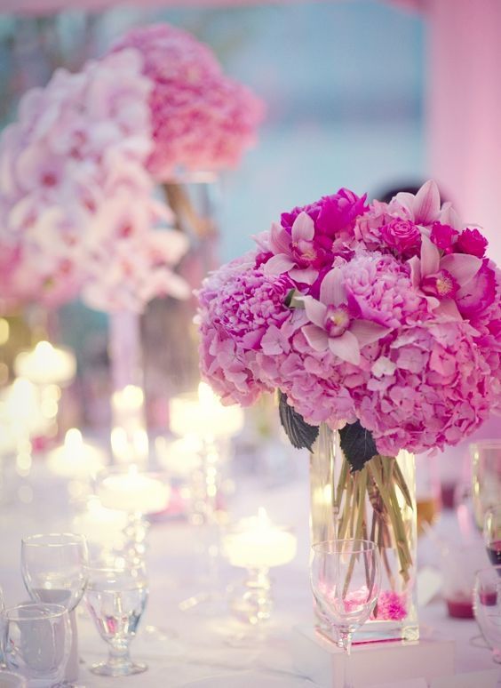 pink wedding reception centerpiece idea via Studio Jeff Photography
