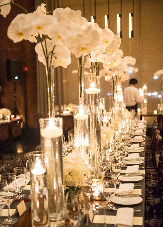 tall orchid wedding centerpiece idea via A Day of Bliss Photography