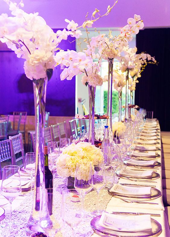 white orchid wedding centerpiece idea via A Day of Bliss Photography