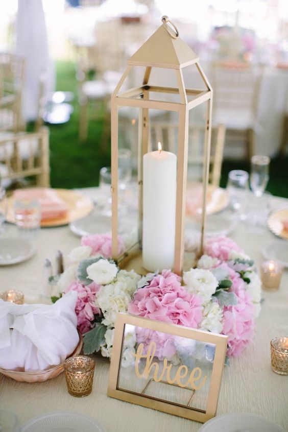 Elegant pink, white, and gold centerpieces