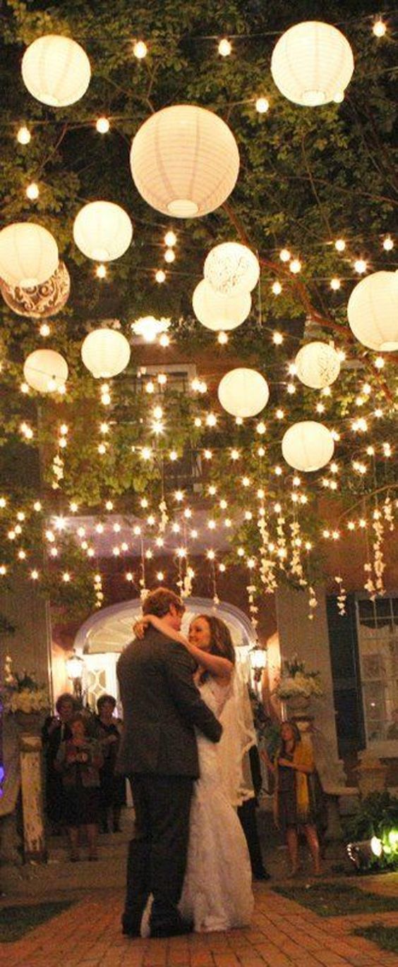hanging paper lanterns and lights wow factor wedding decorations
