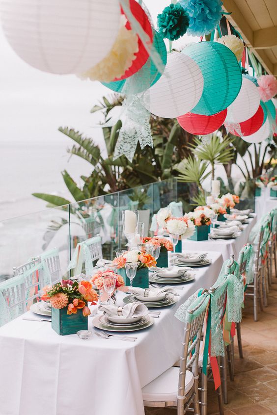 teal, aqua, and coral paper lantern wedding ideas via Steve Cowell Photo