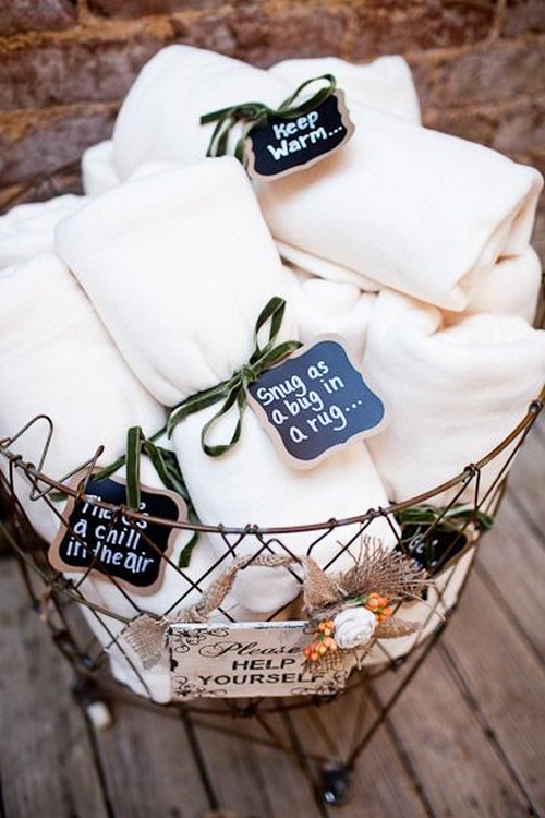 Perfect for an outdoor wedding! Blankets with cute sayings to keep your guests cozy as the sun goes down