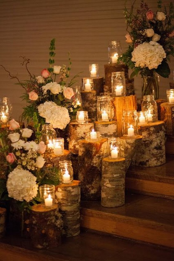 tree stump and floral pails rustic wedding decor