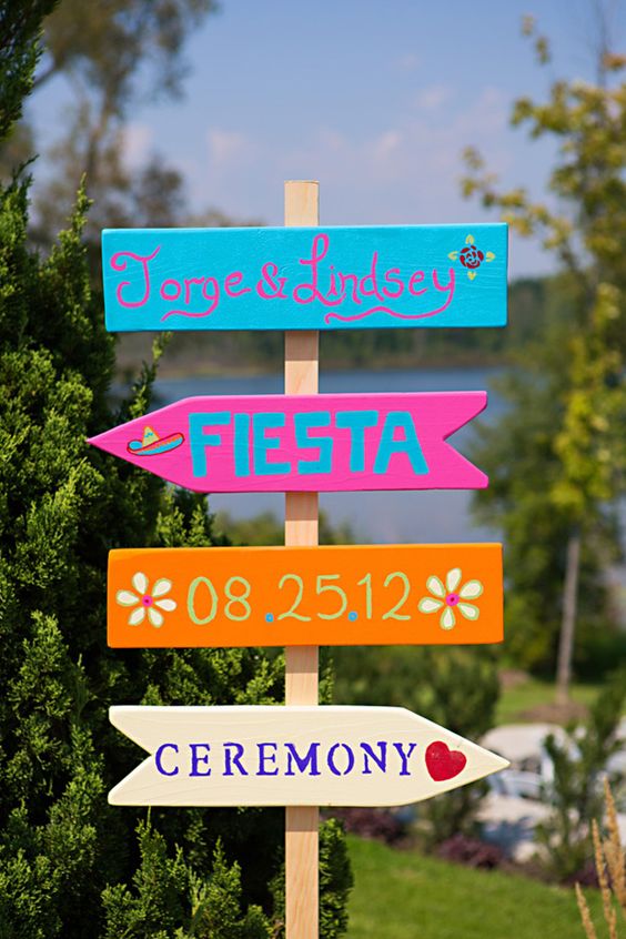 colorful festive wedding signage