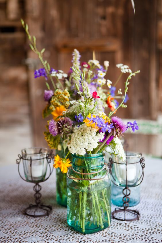 wildflowers in blue mason jar boho wedding centerpiece