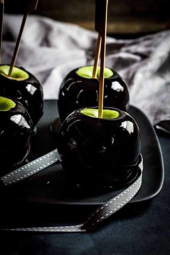 Serve black candy apples during cocktail hour