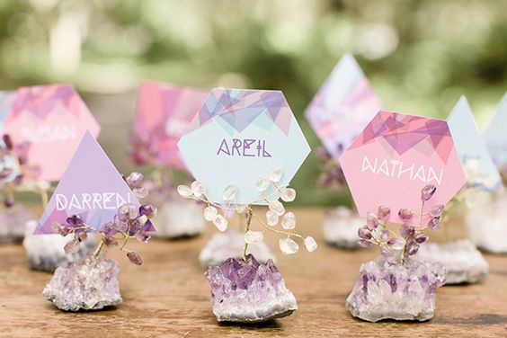 Baby’s breath in wine boxes with place cards on top