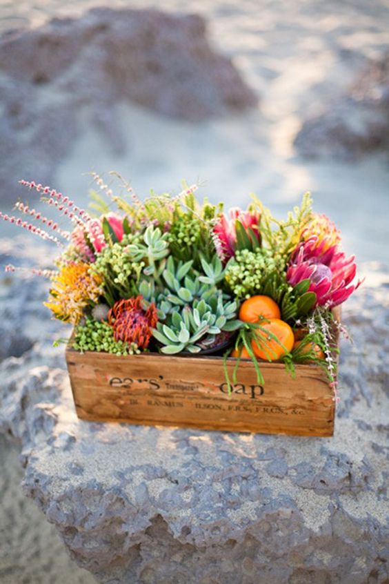 rustic boxes to complement bright floral arrangements