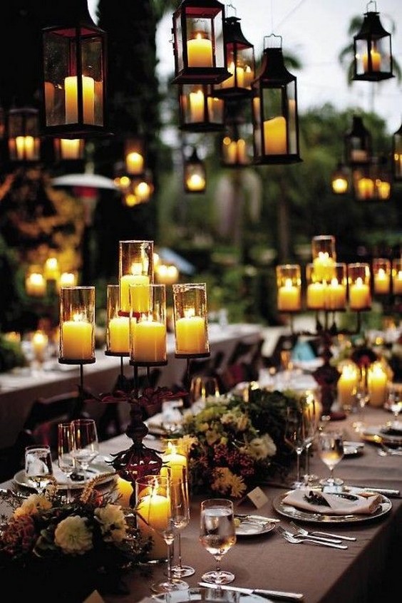 lots of candles for an outside wedding