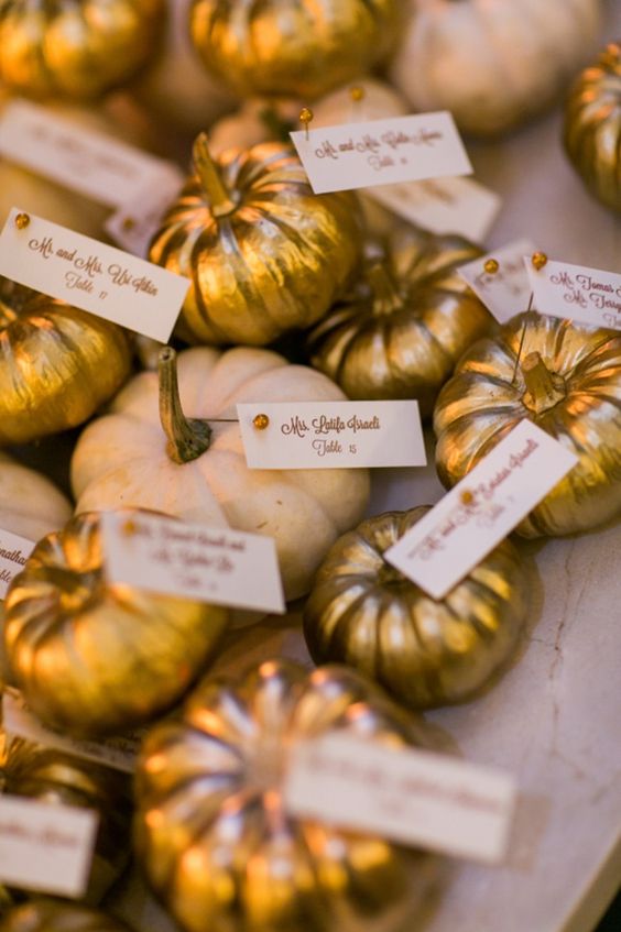 Gilded pumpkins add an instant touch of glam to any wedding table