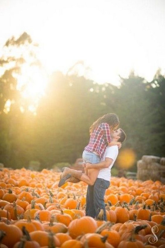 Hug in a Pumpkin Patch Engagement Photo