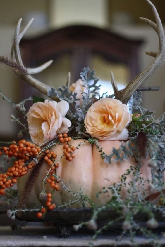 Pumpkins and antlers get a grownup makeover in this centerpiece