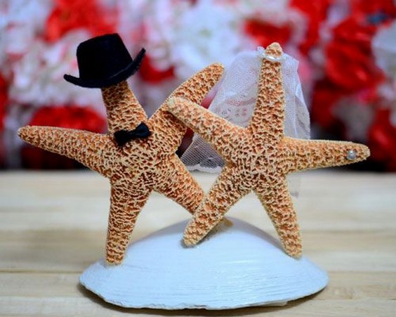 starfish and coral flowers beach wedding centerpiece