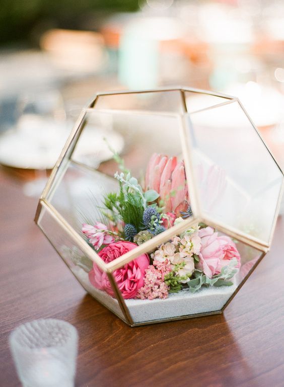 Mini floral terrarium wedding centerpiece