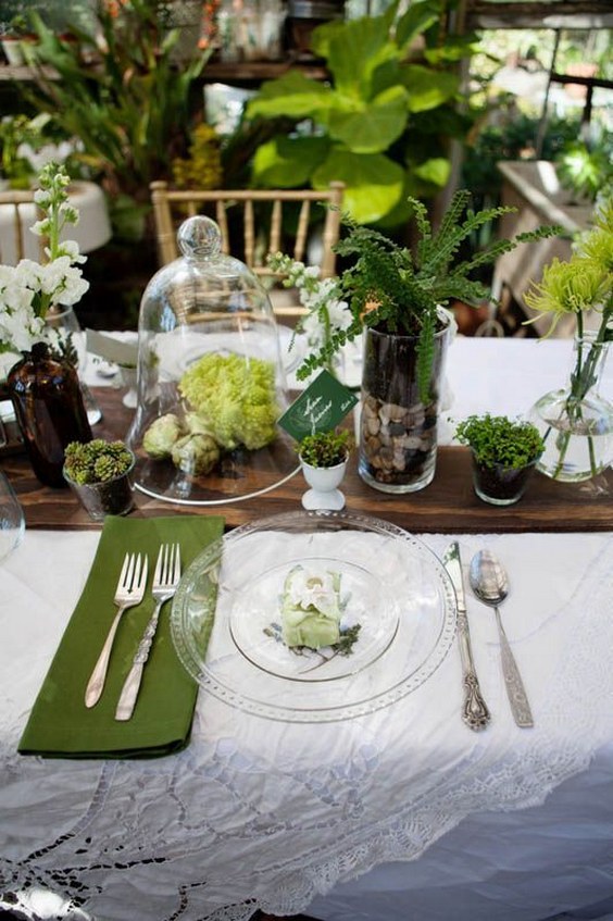 natural greenery and succulents in bell jar wedding centerpiece