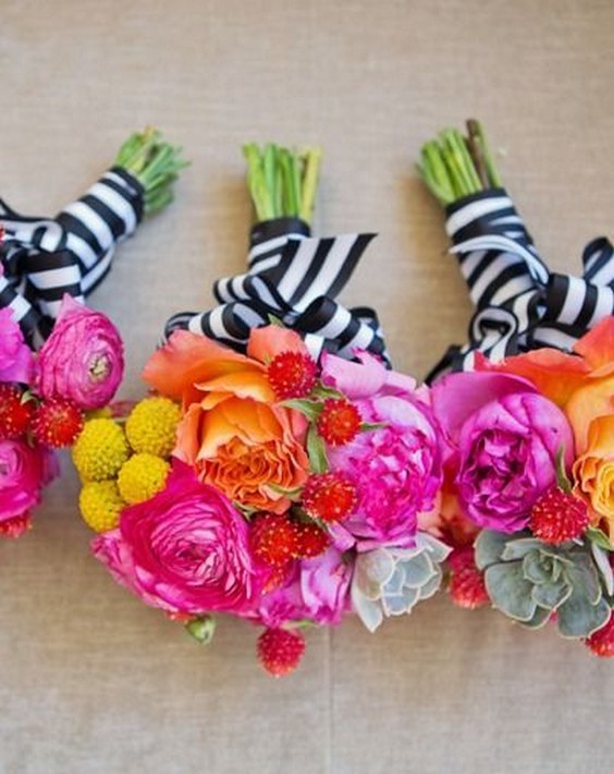 colorful wedding bouquets with striped ribbon