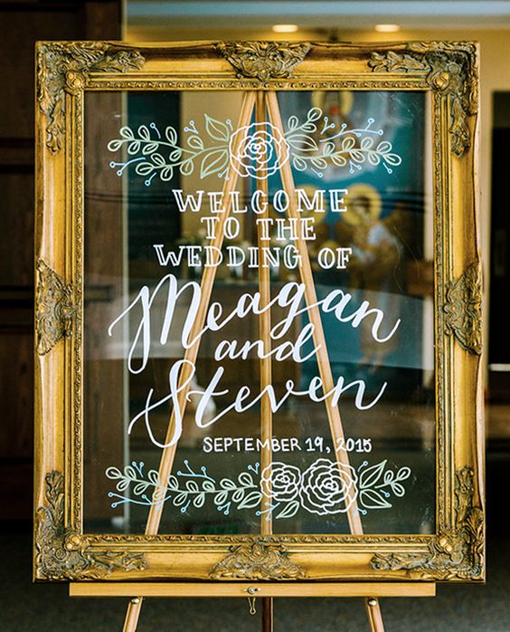 hand lettered hand drawn wedding welcome sign
