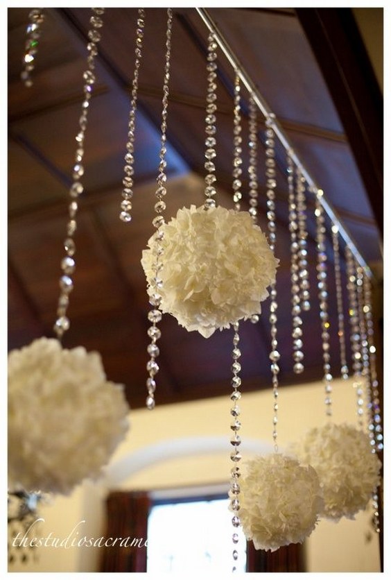 Hanging Crystals and Pom Poms Wedding Decor