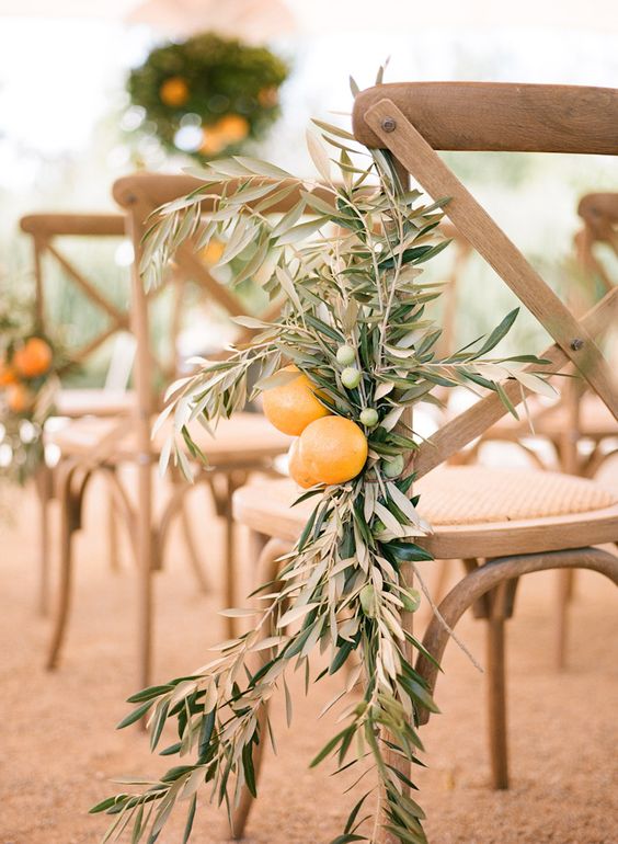 Olive branch and citrus ceremony décor