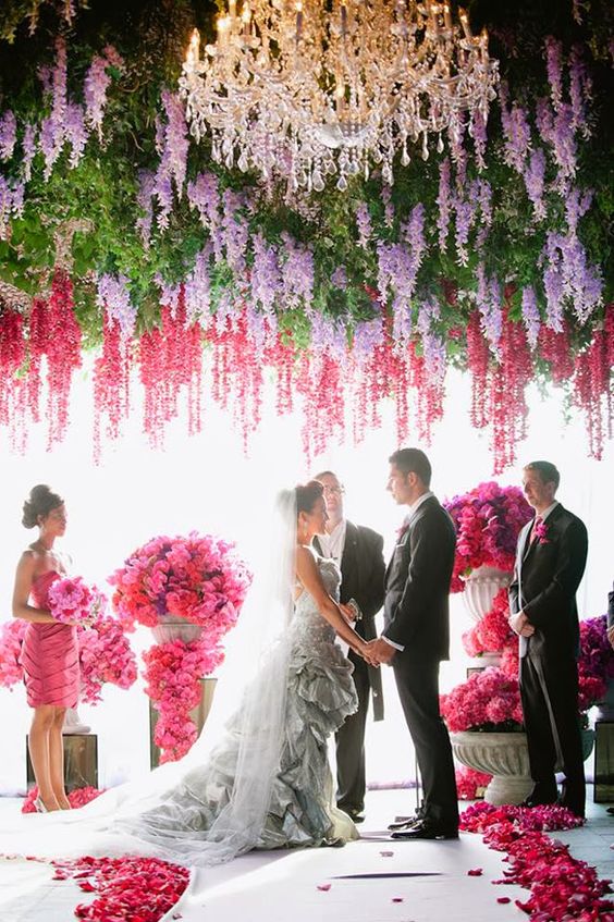 purple and pink wedding ceremony decor