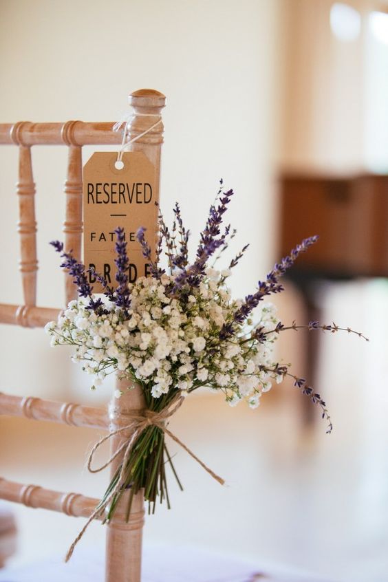 Purple wedding aisle decor