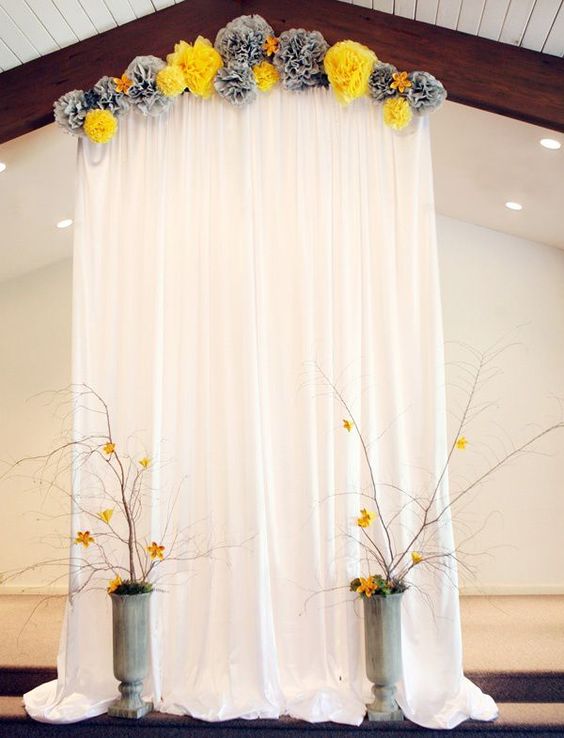Tissue Pom Accented Backdrop
