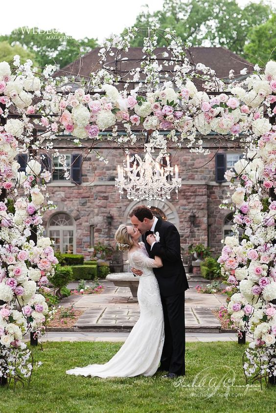 well designed floral arrangements wedding arch