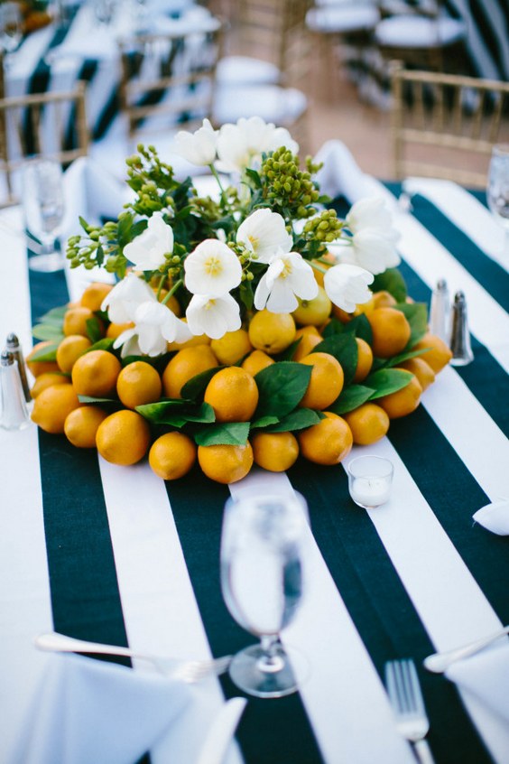 citrus and flowers wedding centerpiece