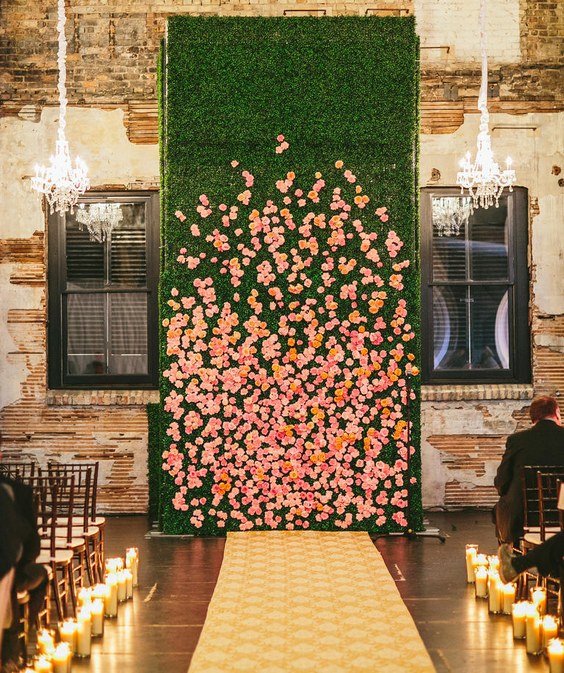 country moss wedding backdrop with peach pink roses