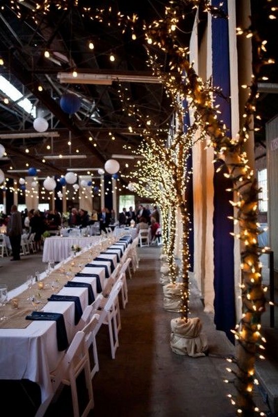 navy blue and gold barn wedding decor