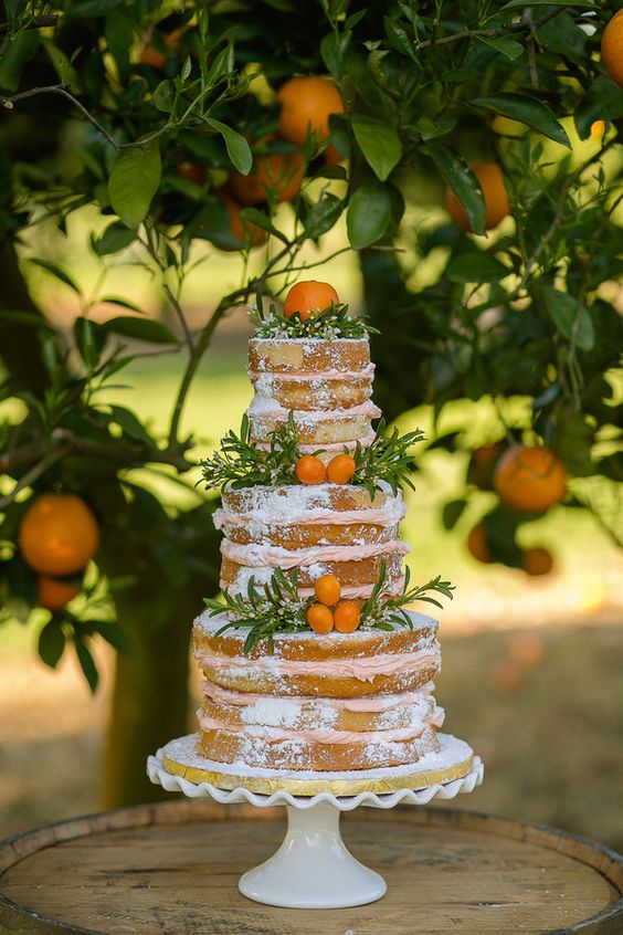 wedding cake in an orange grove